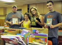 Photo of Alpha Chi Volunteers with donated books