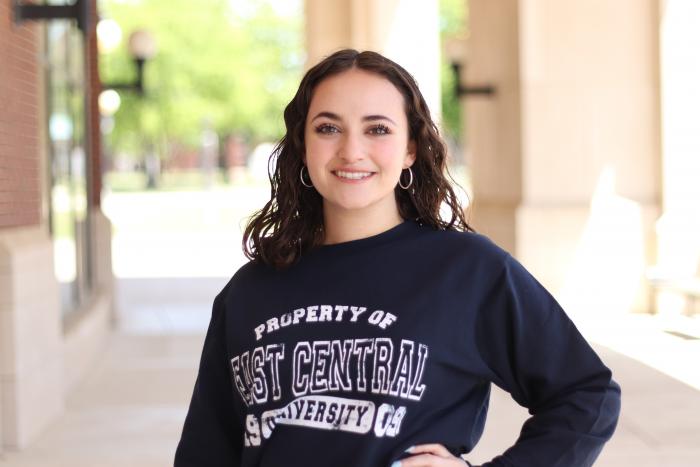 Female student wearing an ECU sweatshirt